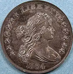 The obverse of a coin depicting an allegorical woman